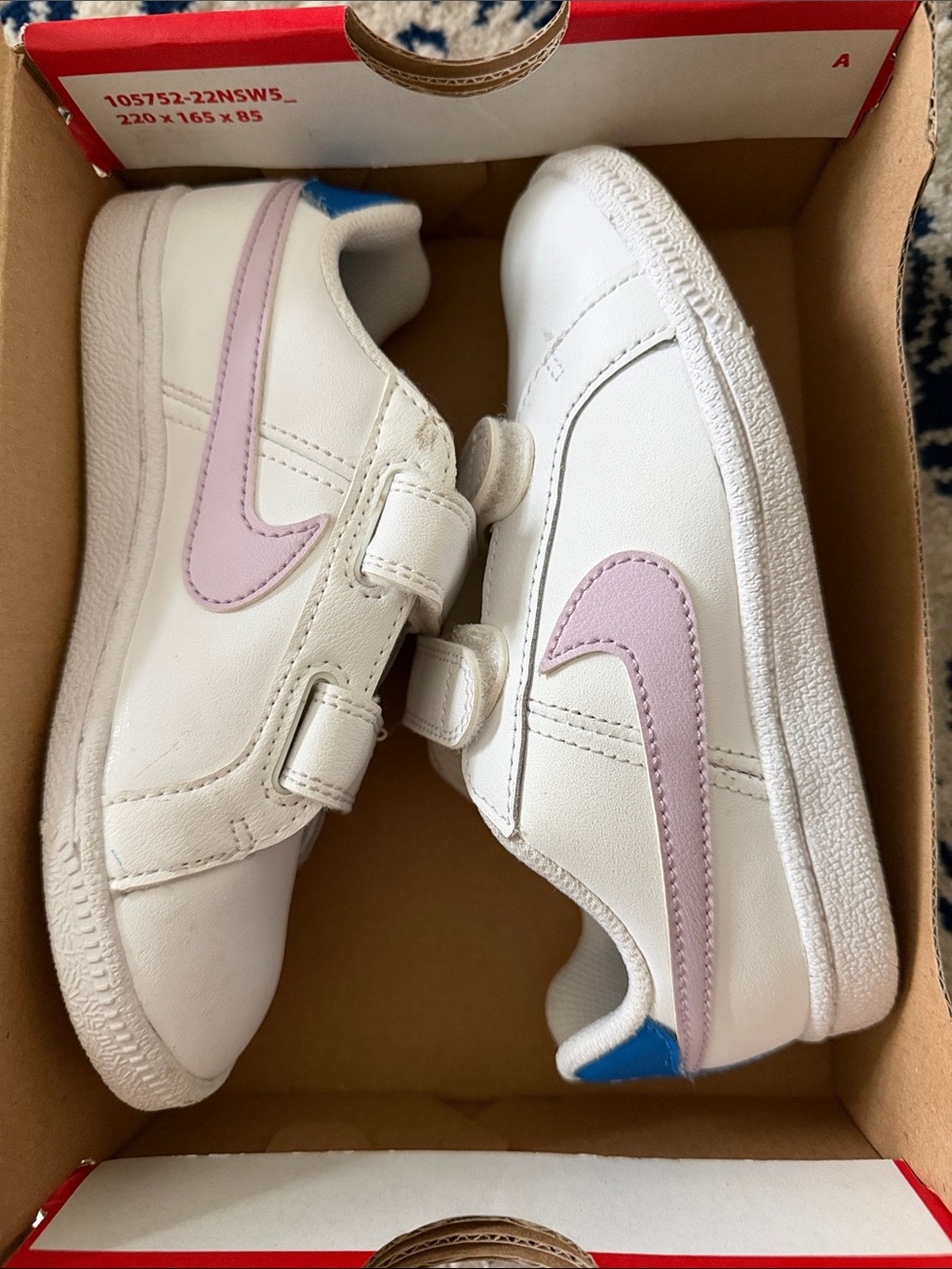 Nike Kids White Sneakers with Light Pink Swoosh and Blue Heel Tab